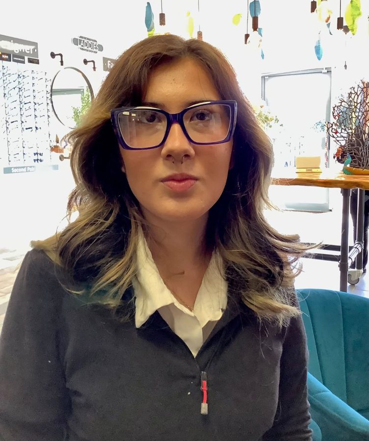 A happy patient wearing new glasses