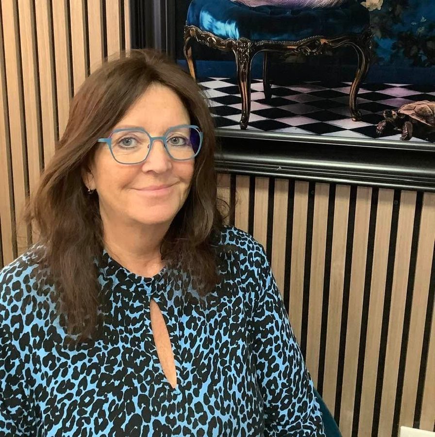 A happy patient wearing new glasses