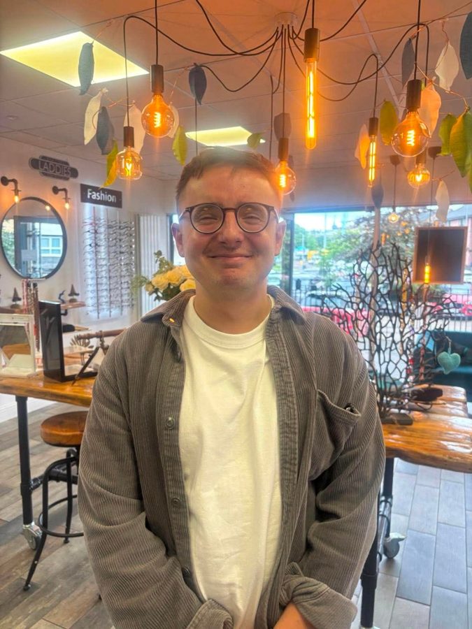 A happy patient wearing new glasses