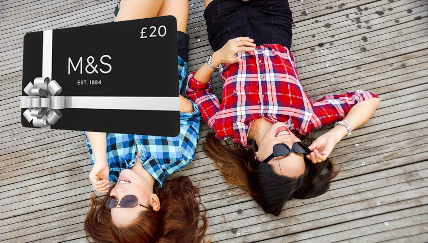 Two friends relaxing, with a £20 Marks & Spencer gift card