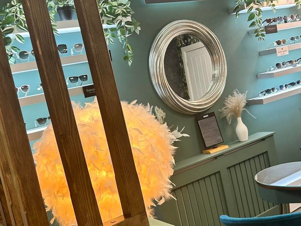 The sunglasses lounge with its feather lamp and gilded mirror